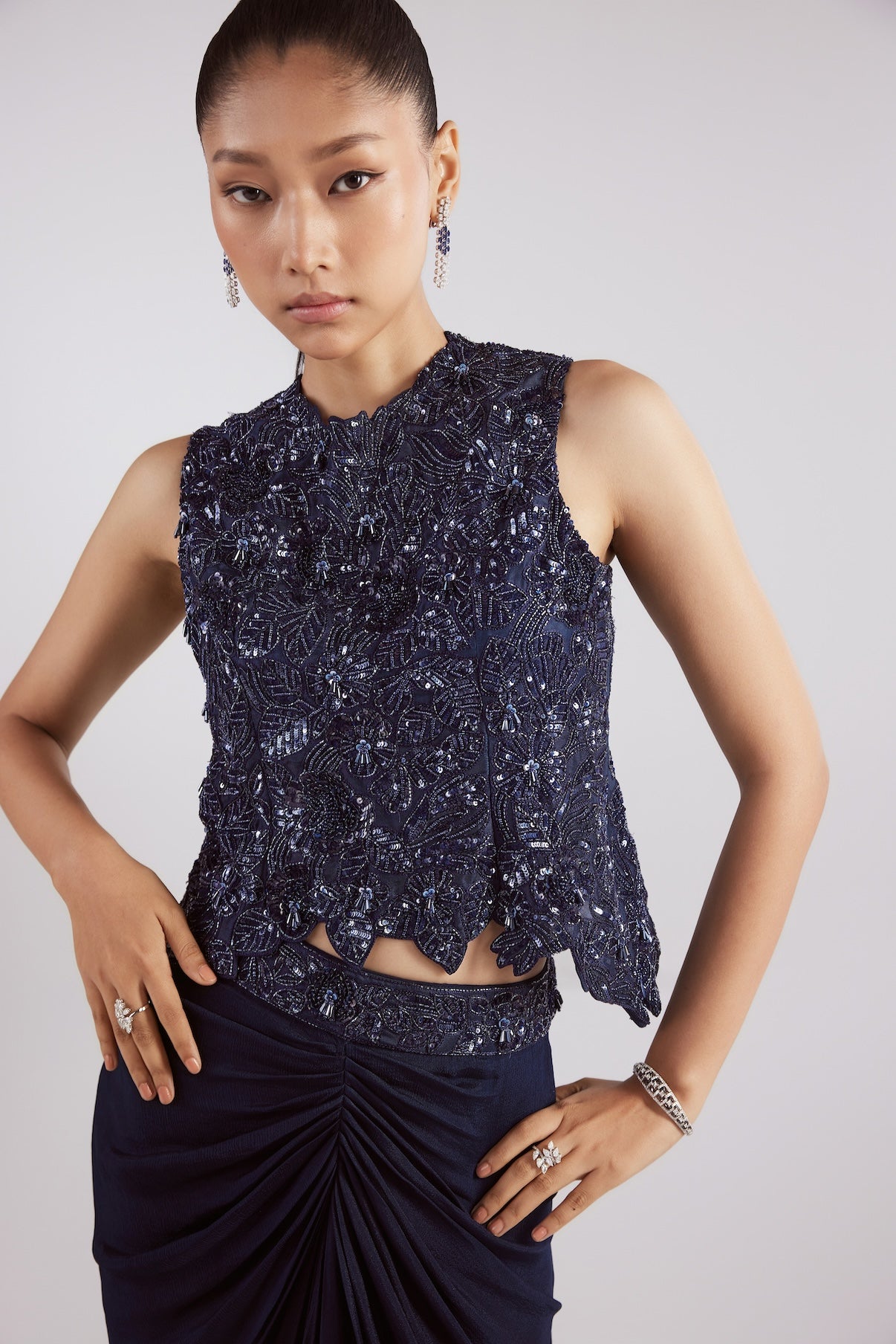 NAVY SELF ON SELF TOP WITH DRAPE SKIRT