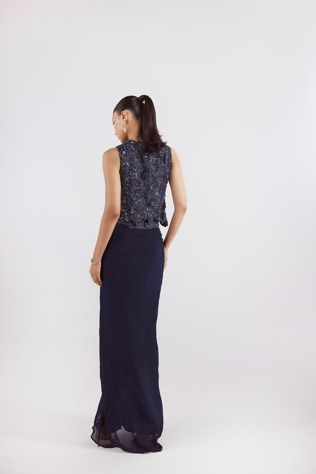 NAVY SELF ON SELF TOP WITH DRAPE SKIRT