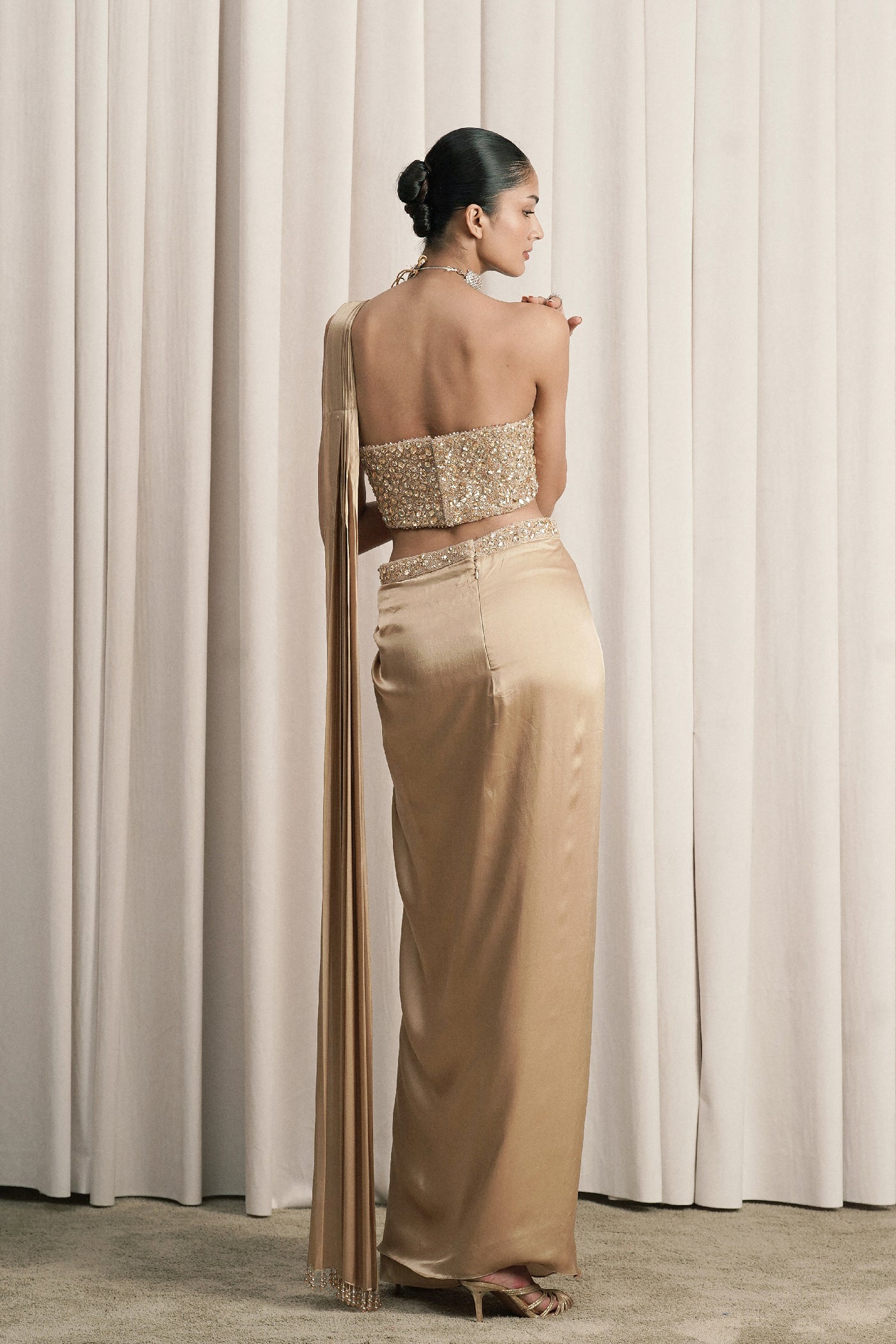 BEIGE DRAPED SAREE WITH EMBELLISHED CORSET