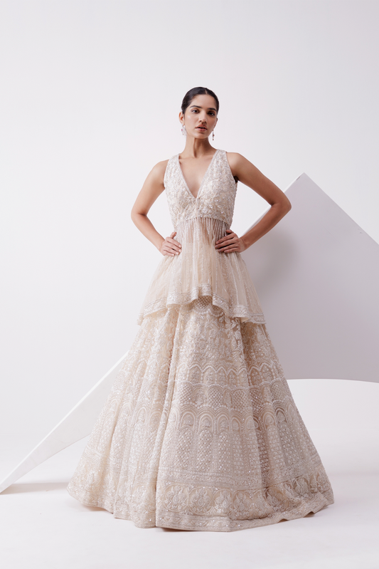 BEIGE NET EMBROIDERED LEHENGA WITH PEPLUM JACKET