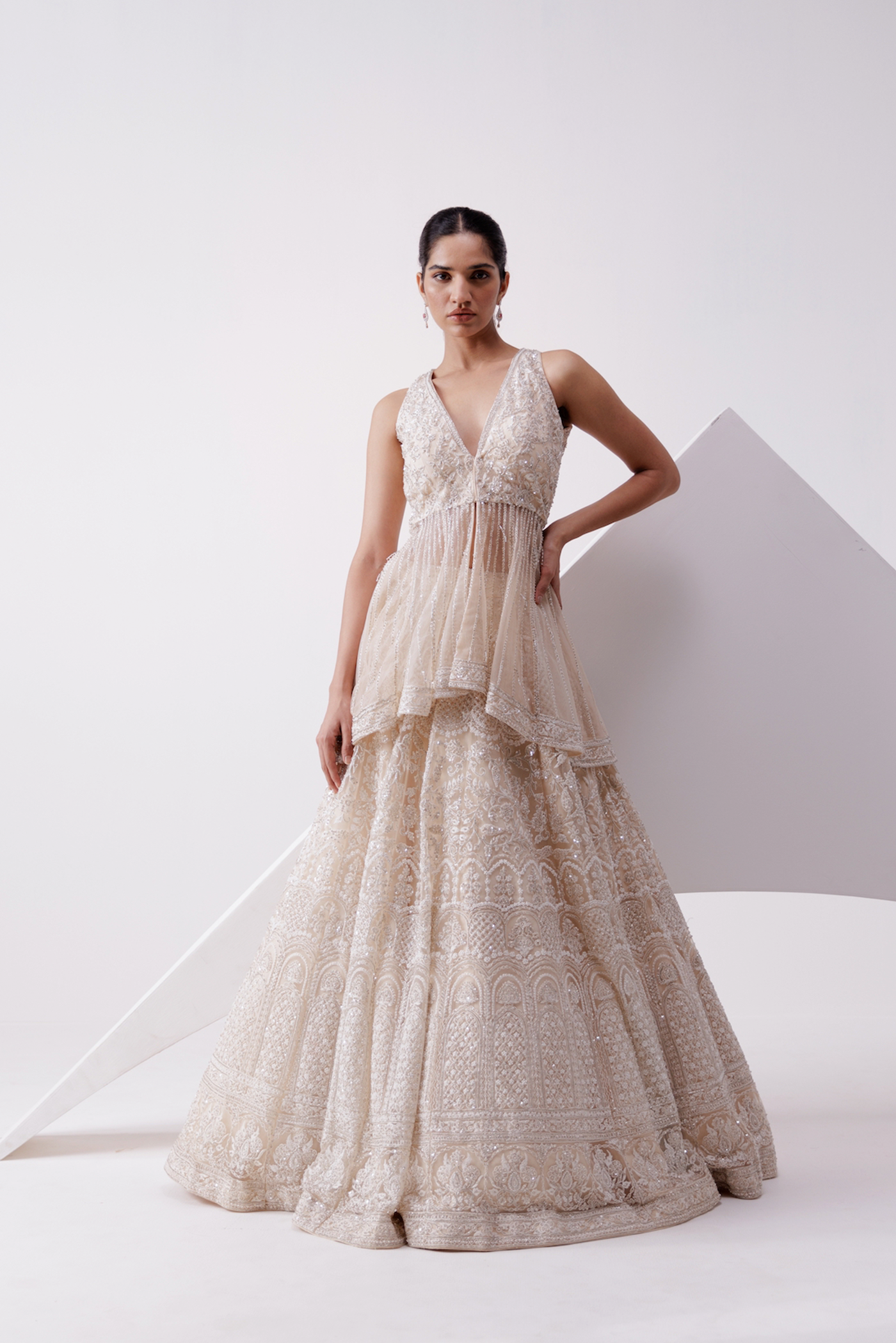 BEIGE NET EMBROIDERED LEHENGA WITH PEPLUM JACKET