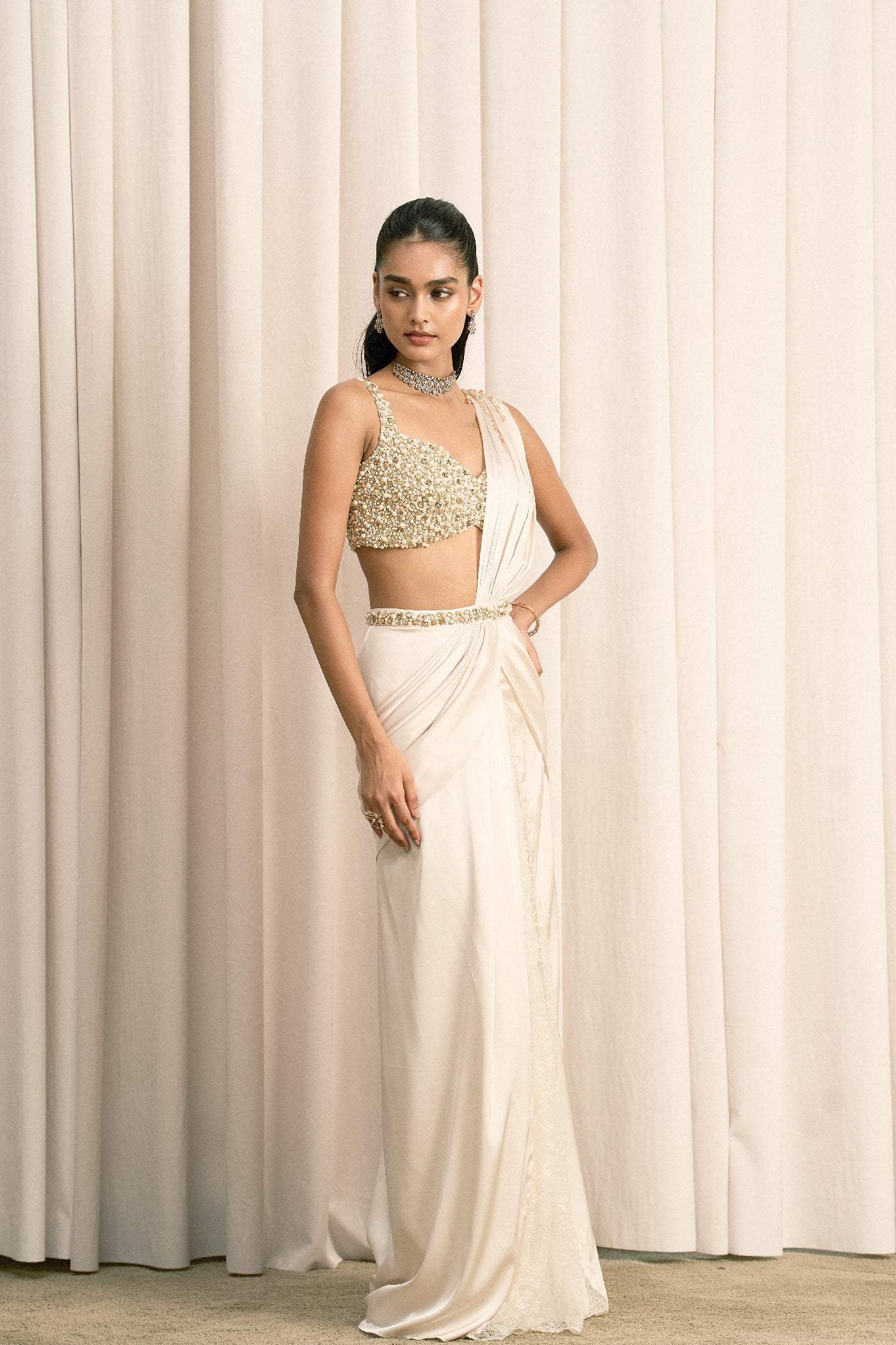 IVORY DRAPED SATIN SAREE WITH EMBELLISHED BLOUSE