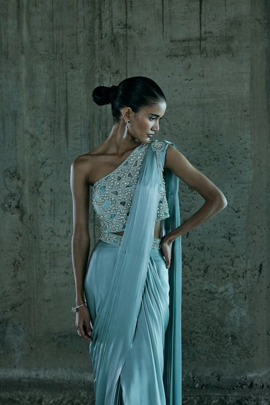 ICE BLUE STONE EMBELLISHED BUSTIER PAIRED WITH DRAPE SAREE