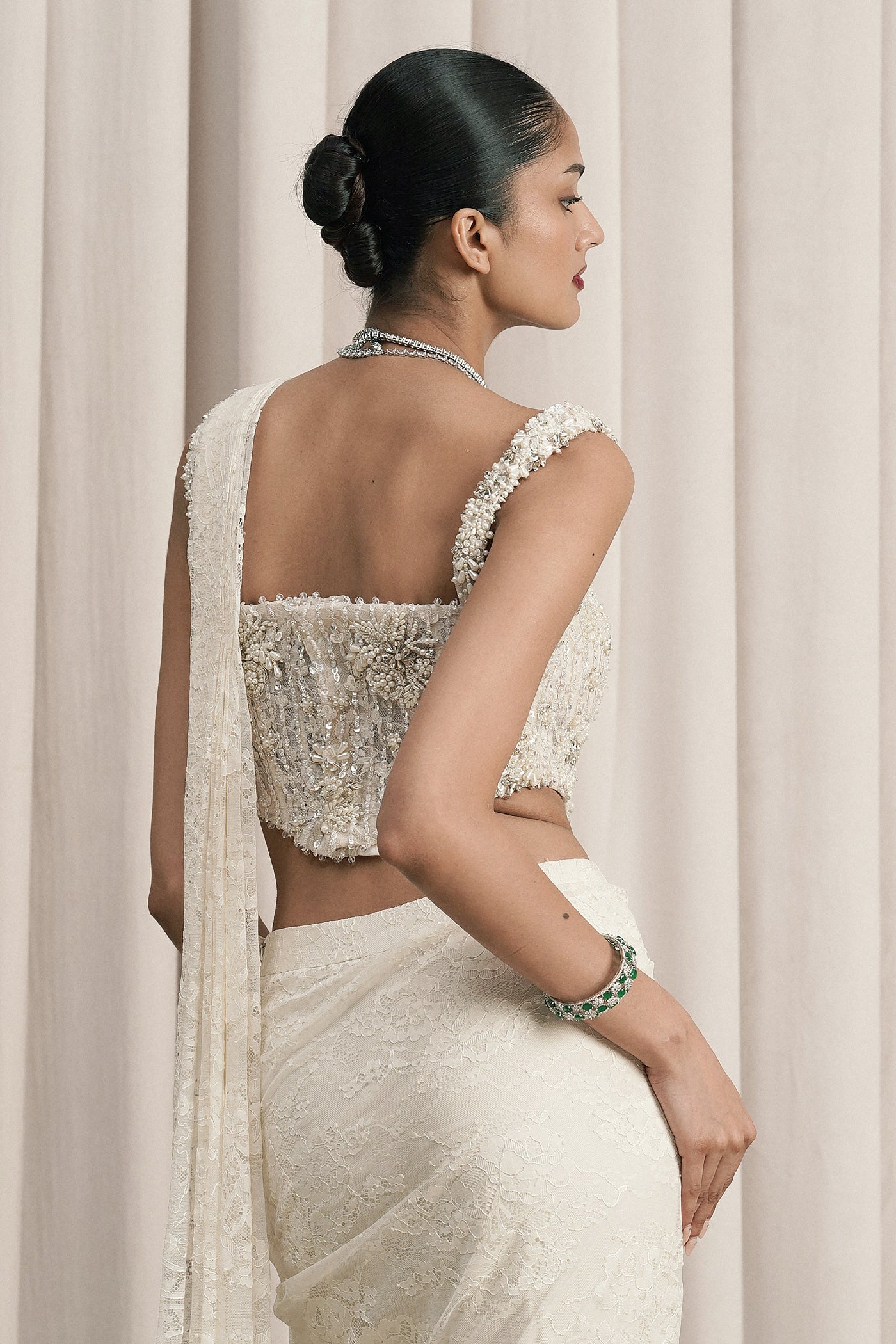 IVORY DRAPED SAREE WITH EMBELLISHED CHANTILLY CORSET