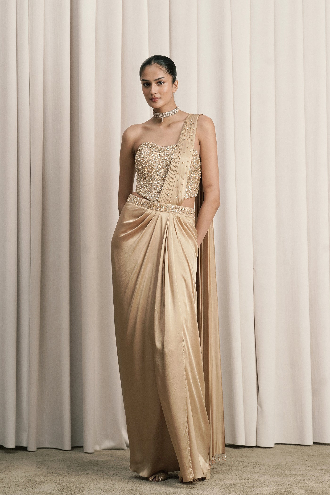 BEIGE DRAPED SAREE WITH EMBELLISHED CORSET