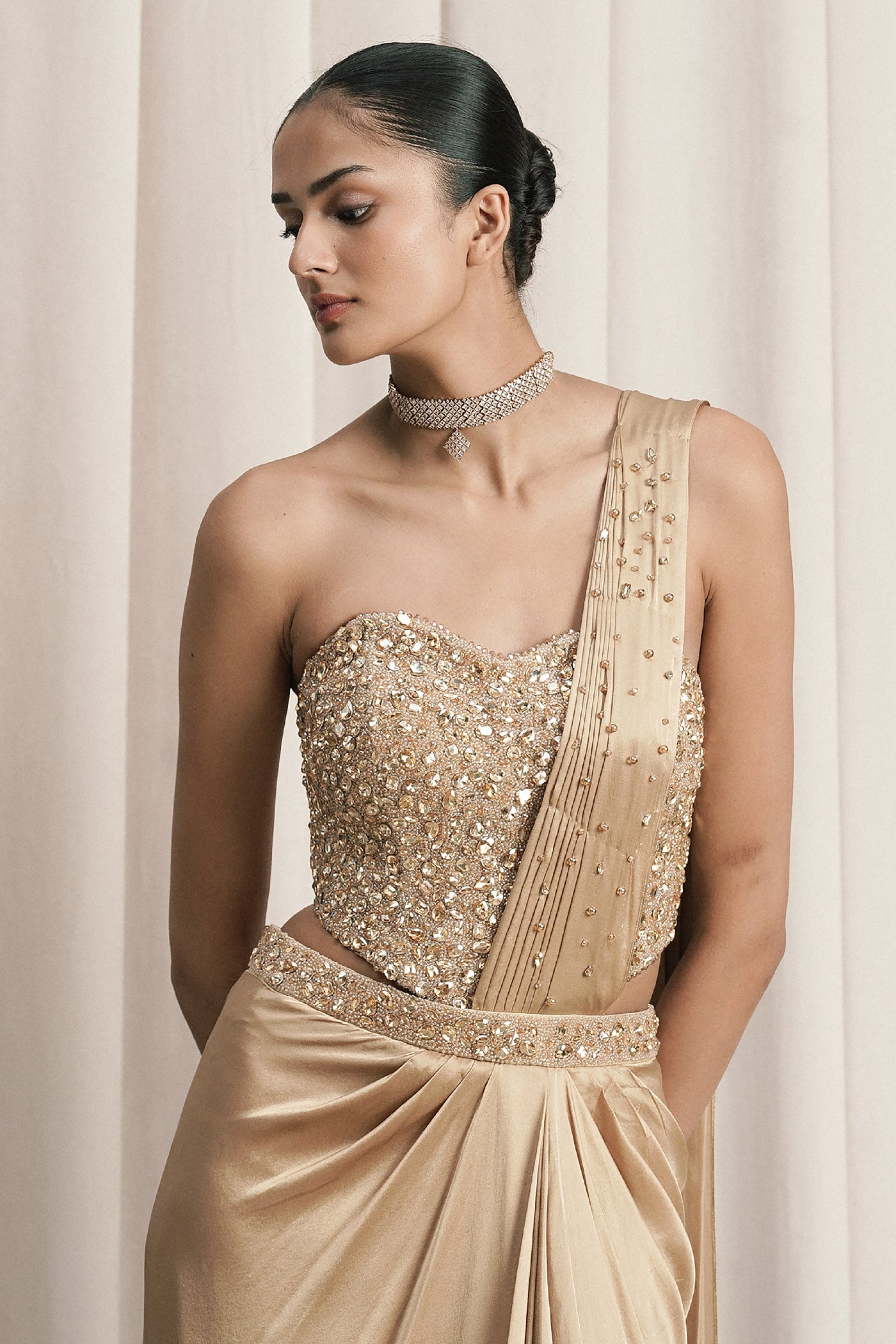 BEIGE DRAPED SAREE WITH EMBELLISHED CORSET