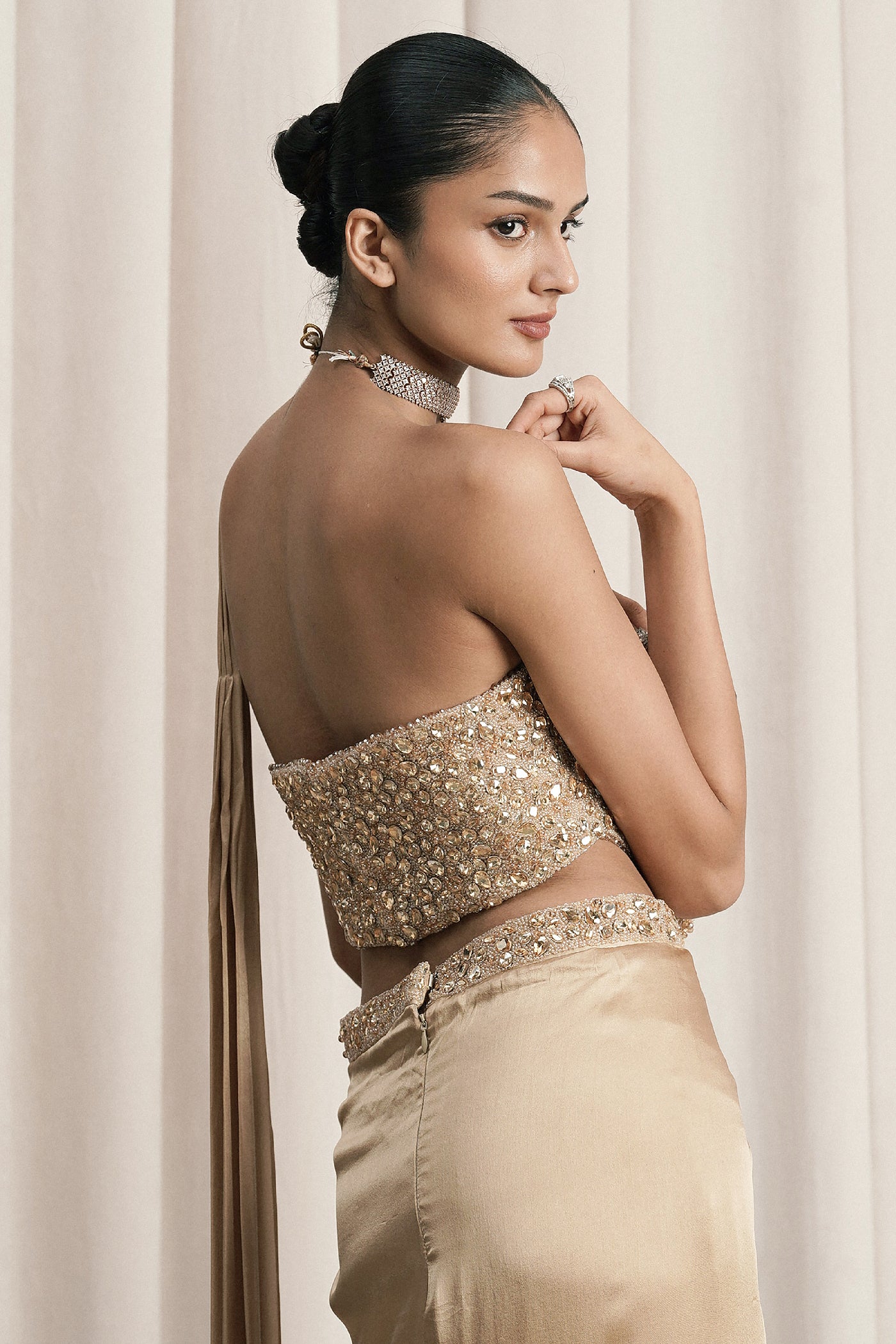 BEIGE DRAPED SAREE WITH EMBELLISHED CORSET