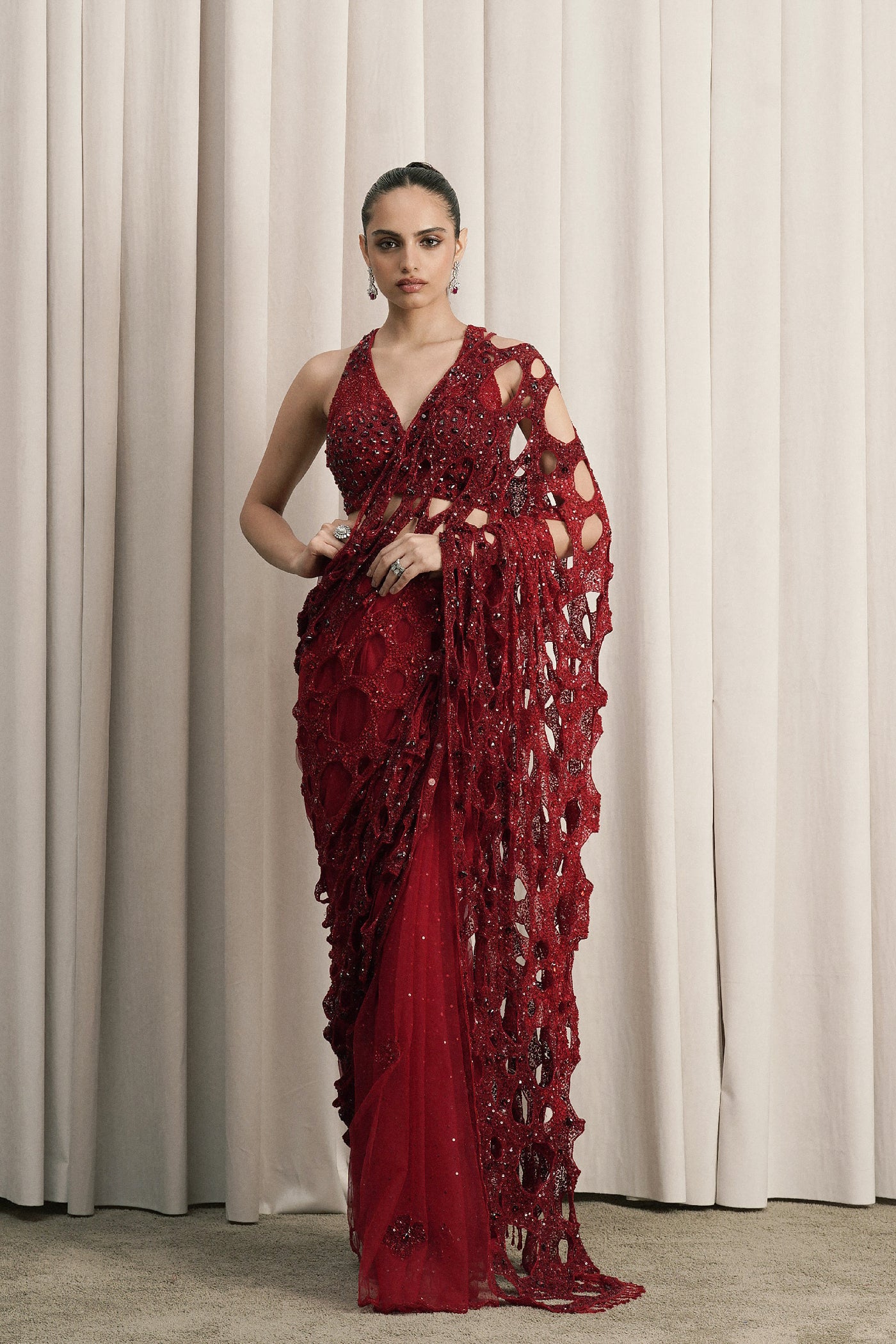 RED NET SAREE WITH HALTER-NECK BLOUSE