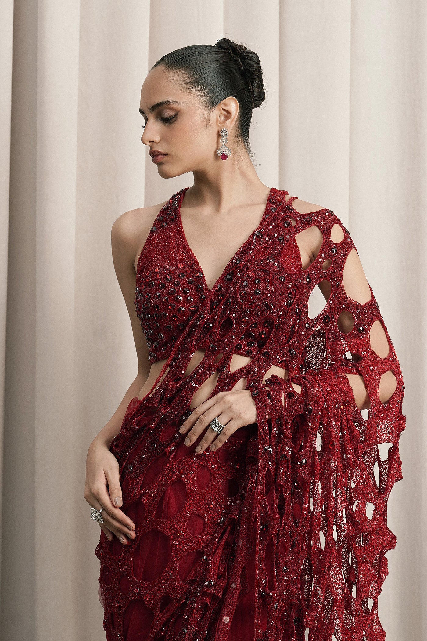 RED NET SAREE WITH HALTER-NECK BLOUSE