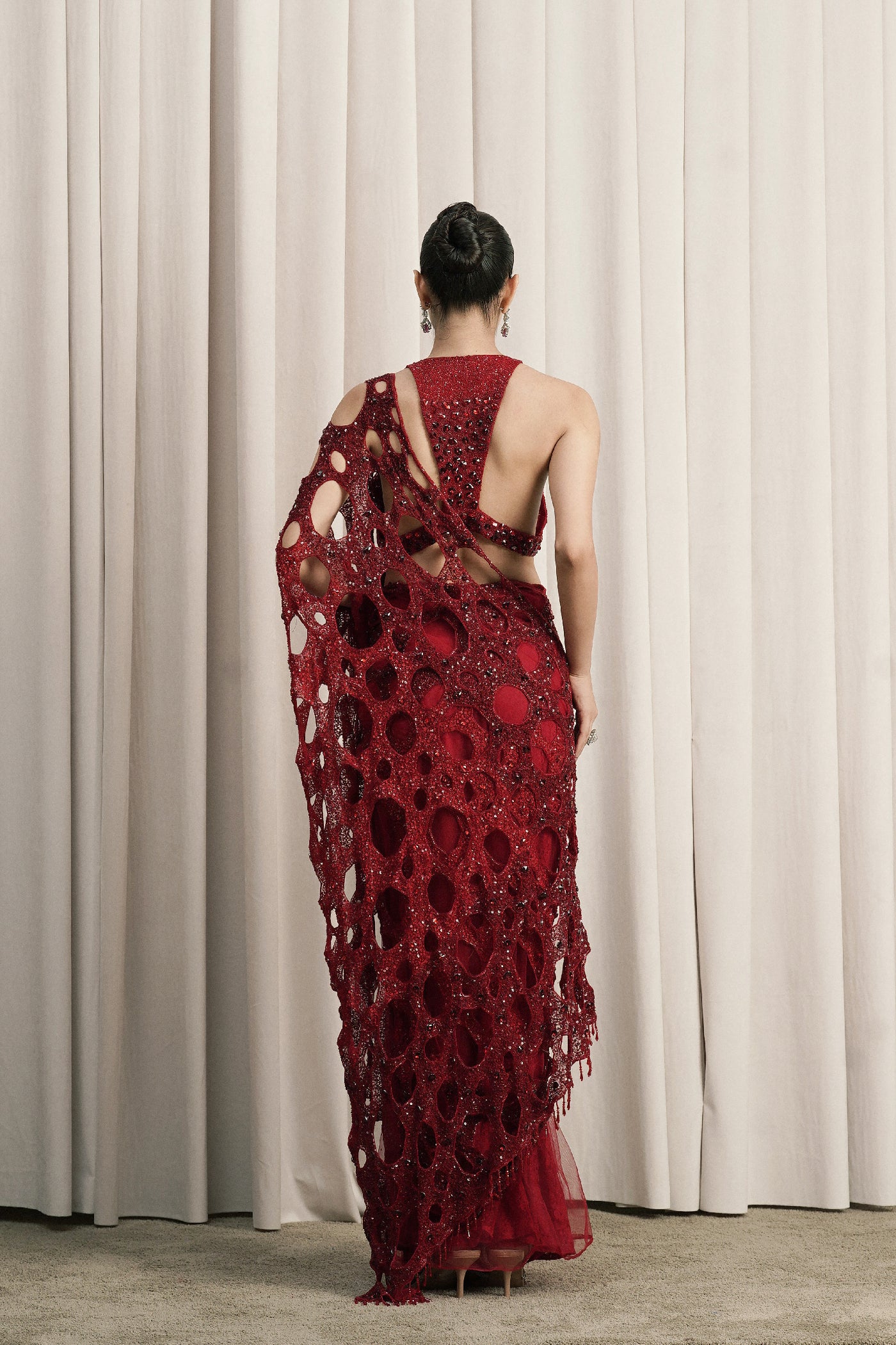 RED NET SAREE WITH HALTER-NECK BLOUSE